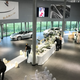 Illustration for article titled This Couple Topped Your Wildest Dreams By Getting Married In A Porsche Showroom